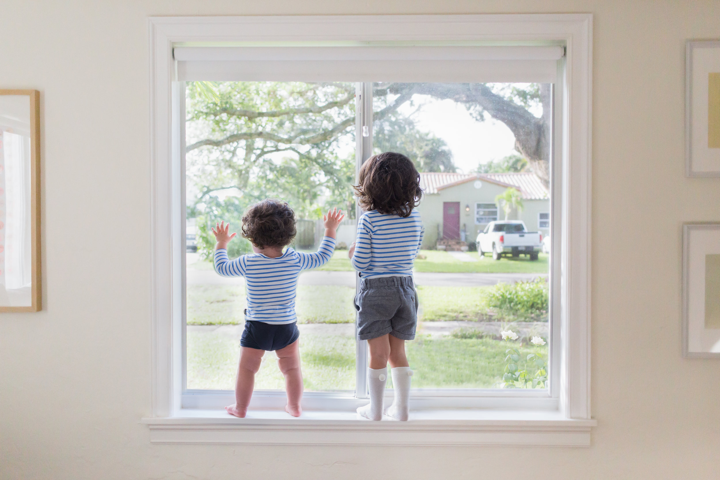 (NOTE: This is a composite image. Mom and Dad were right below the children. A seperate image of the window was taken afterwards. The children were never in any danger.)